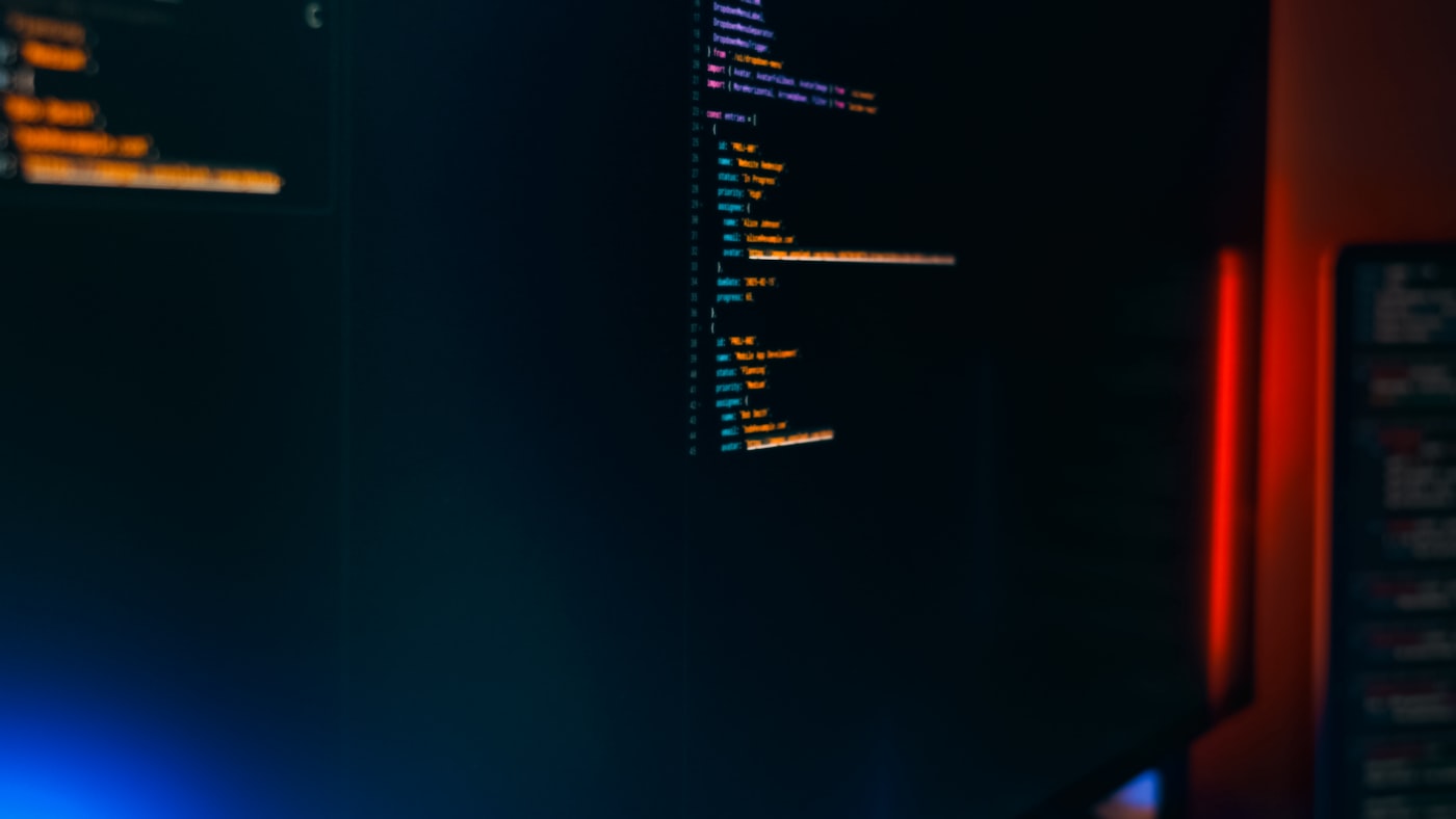 Engineer reviewing Ansible automation playbooks and network configuration